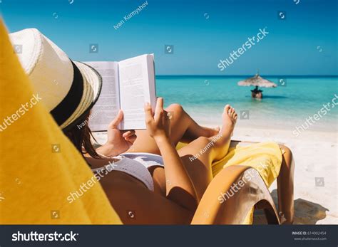Woman On Sunbed Reading Book Tropical Stock Photo Edit Now