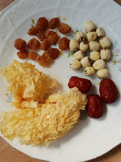 A 'warming' tea, red dates longan tea helps to nourish the blood, builds up qi and strengthen the spleen and stomach. Dried Lotus Seed, Dried Red Dates, Dried Longan Dessert ...