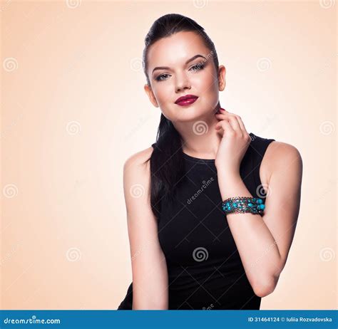 Portrait Of Beautiful Fashion Model Posing In Exclusive Jewelry Stock