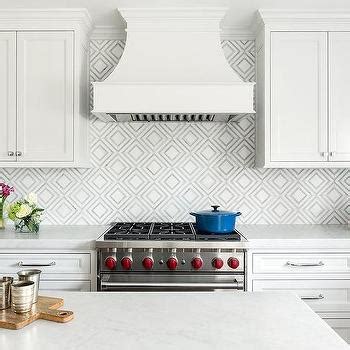 These patterned tiles are made from different materials but only comes in a single elongated diamond shape. White Diamond Pattern Tile Backsplash - Cottage - Kitchen