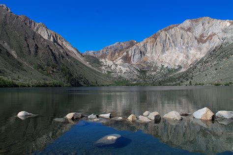 Free Stock Photo Of Mountains Behind Lake With Reflection
