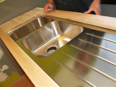 Taking a product from ikea and modifying it to do something it was not originally intended to do. boholmen undermount | Resurfacing kitchen cabinets ...
