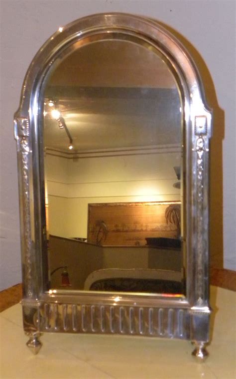 Try finding the one that is. Art Nouveau WMF Silver Vanity Mirror | Mirrors | Art Deco ...