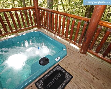 Water temperature is set between 100 to 104 degrees fahrenheit. Ohio Cabin with Hot Tub