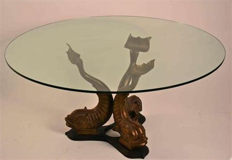 Shop collections of fab vintage end tables. Brass Base Glass Top Dolphin Table at 1stdibs