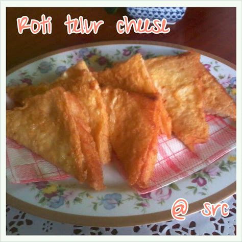 Roti cheese, stuffed with cheese. Sweet red cherry: ROTI TELUR CHEESE