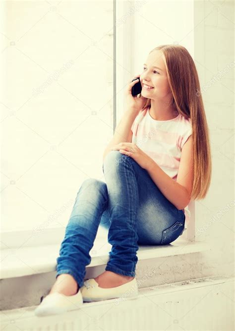 Girl With Smartphone At School — Stock Photo © Sydaproductions 52050191