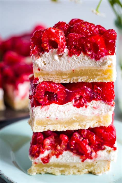 In a separate bowl, sift dry ingredients together and fold into creamed mixture alternately with water. raspberry cream cheese layer bars stacked | Raspberry ...