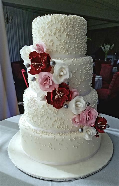 18 years of age or over only. All about the pearls. Wedding cake with pearls and a ...