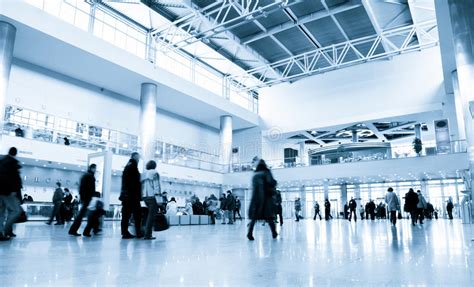 People Silhouettes In Motion Blur Airport Interior Stock Photo Image
