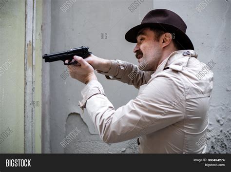 Detective Taking Cover Image And Photo Free Trial Bigstock
