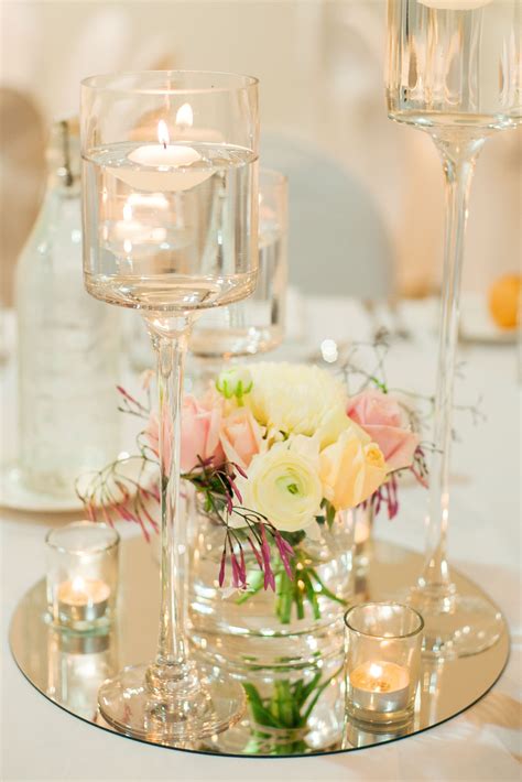 Such a centerpiece will suit a beach, classic, rustic, boho and many other wedding styles, choose the flowers you love and the colors according to the. Silver Wedding Decorations For Tables | Floating candle ...