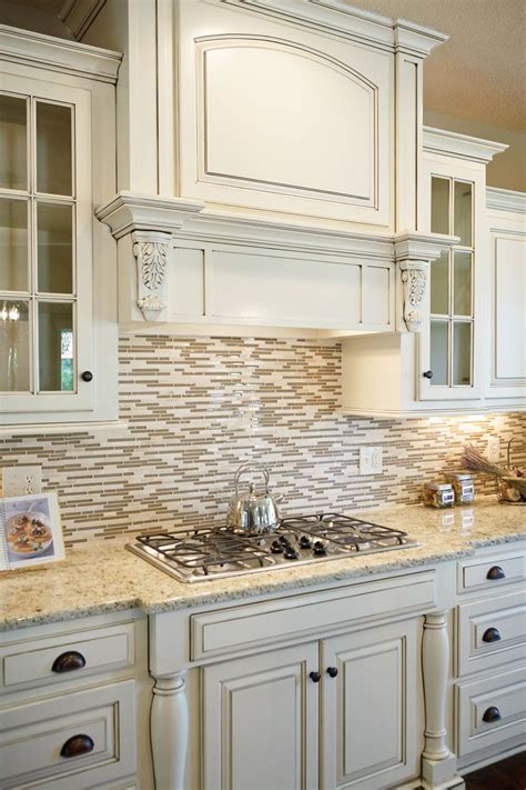 white counters  granite  tile backsplash kitchen