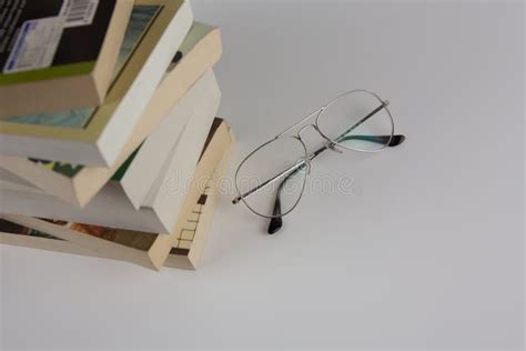 A Stack Of Books And Glasses Stock Image Image Of Isolated Information 178815519