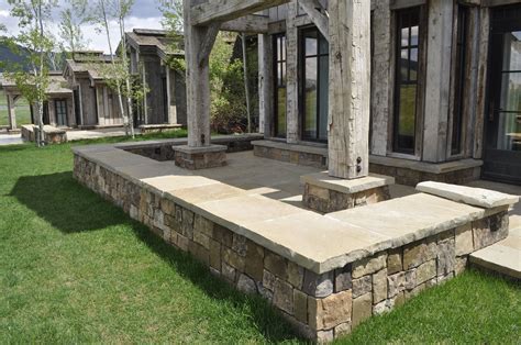 Cap stones sit atop landscape walls. Sills and Caps | Select Stone