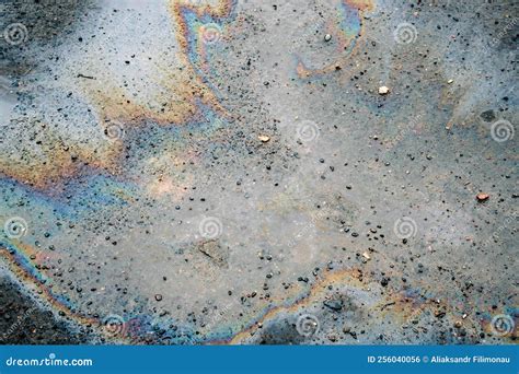 Dirty Multi Colored Stain From Engine Oil On Asphalt Stock Photo