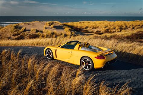 Download Yellow Car Porsche Car Vehicle Porsche Carrera Gt Hd Wallpaper