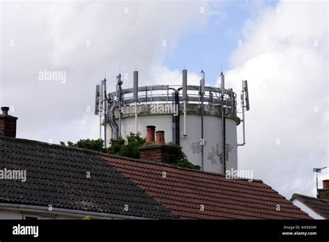 Telephone Masts Installed On A Village Water Tower In The Heart Of A