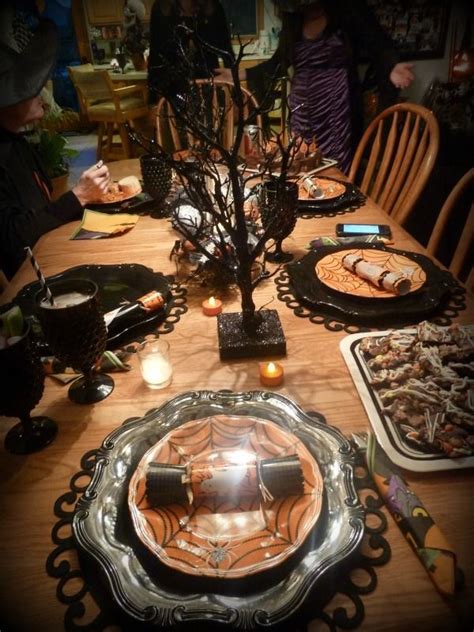 Black Dishes Make For A Spooky Halloween Table Set Up Dining Room