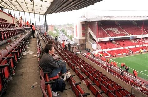 Fans Sit In The North Bank As Arsenal Stadium Empties After