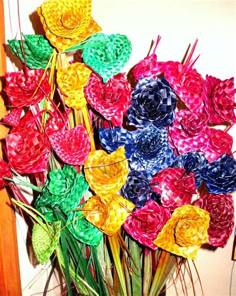 flax woven flowers in a rainbow of colours creations of forever flax floral art arrangements