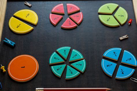 Colorful Math Fractions On Dark Wooden Background Or Table Interesting