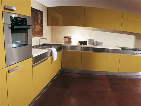 And window mullions and frame bring drama to the light. Yellow Kitchens