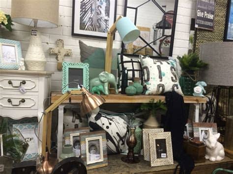 I'll definitely come back for more products! Mint and black shop display. Visual merchandising at ...