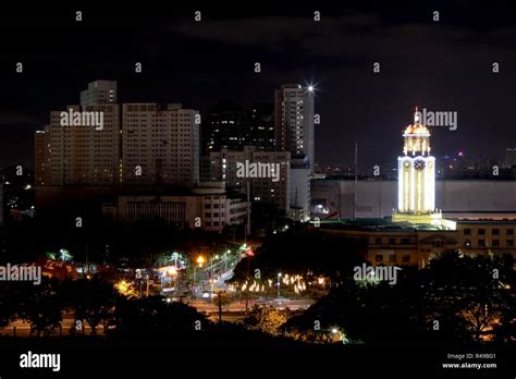 The Manila City Hall Clock Tower In The Philippines Is Seen Illuminated