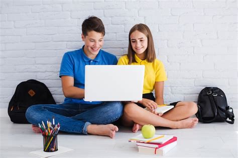 Teenagers Using Laptop Photo Free Download