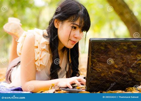 Asian Girl With Laptop Stock Photo Image Of Meadow Outdoor
