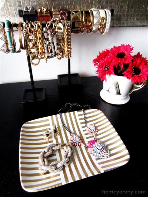 This handy three tier display stand is perfect for craft fairs and markets, and packs down neatly for easy transport. DIY Gold Leaf Jewelry Tray - Homey Oh My