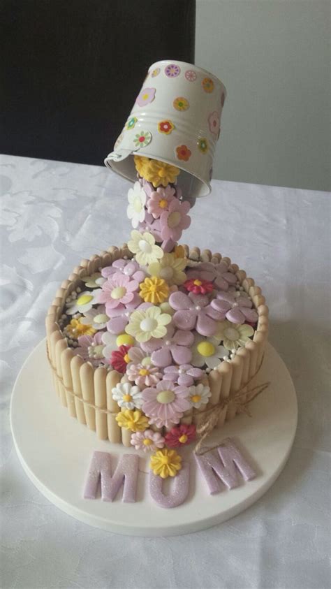 It is also decorated with a few pipings and sugar pearls, one big heart candy and tiny. Anti-gravity Mother's Day cake … | Anti gravity cake