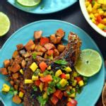 Jamaican Jerk Pork Chops With Curry Spiced Sweet Potatoes And Mango