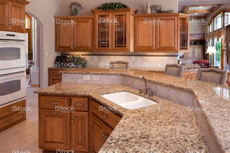 29 fantastic kitchen backsplash ideas with oak cabinets 4. Custom Luxury Eat-In Kitchen With Granite Counters, Oak Cabinets stock photo 10921307 - iStock ...