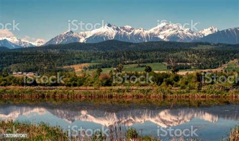 The Columbia River Valley With A Backdrop Of The Purcell Mountains In