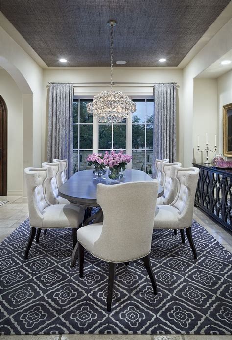 Cream Colored Dining Room With Grey Rug Curtains And