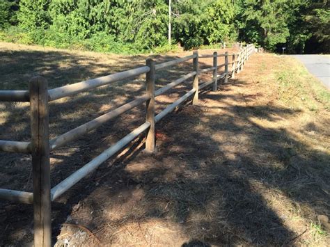 One of the most economical materials for such a fence is landscape timbers. Rustic Landscape in Kirkland - split rail fence, rustic ...
