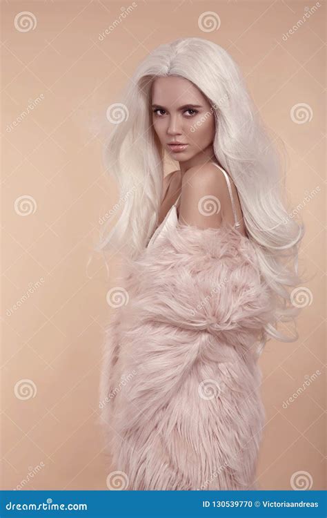 Beautiful Blonde Stylish Woman In Fashion Winter Clothes Fashionable Girl Wearing Pink Fur Coat