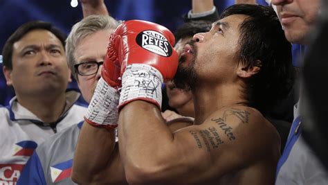manny pacquiao s mom blames loss on switching religion