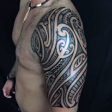 Tribal prints are very famous tattoos that not only men but women as well get done on their arms as half sleeve tattoo. 75 Half Sleeve Tribal Tattoos For Men - Masculine Design Ideas