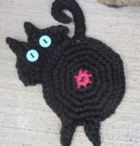 crocheted cat butt coasters are a thing now and feline lovers can t get enough of them