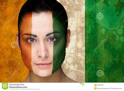 Composite Image Of Beautiful Football Fan In Face Paint Stock Photo