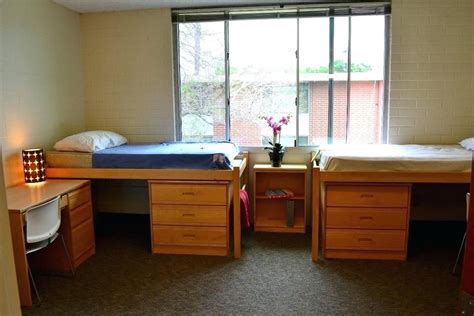 Dorm rooms can be quite tricky to organize since they're often very small and usually contain multiple people. Dorm Room Arrangement Photo Captain Beds Small Dorm Room ...