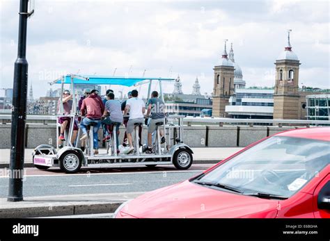 Pedibus Mulit Person Cycle On London Bridge Stock Photo Alamy