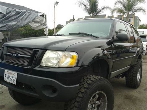 Vehicle does not have an existing warranty trim: Buy used 2003 Ford Explorer Sport XLT Sport Utility 2-Door ...