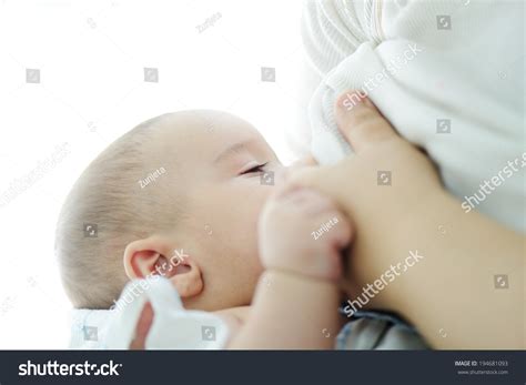 Baby Feeds On Mothers Breasts Milk Stock Photo Shutterstock