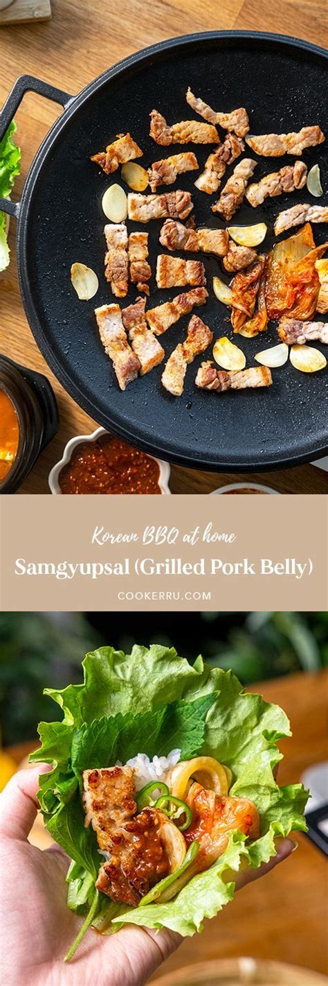Samgyupsal Grilled Pork Belly Garlic And Kimchi On A Cast Iron Pan