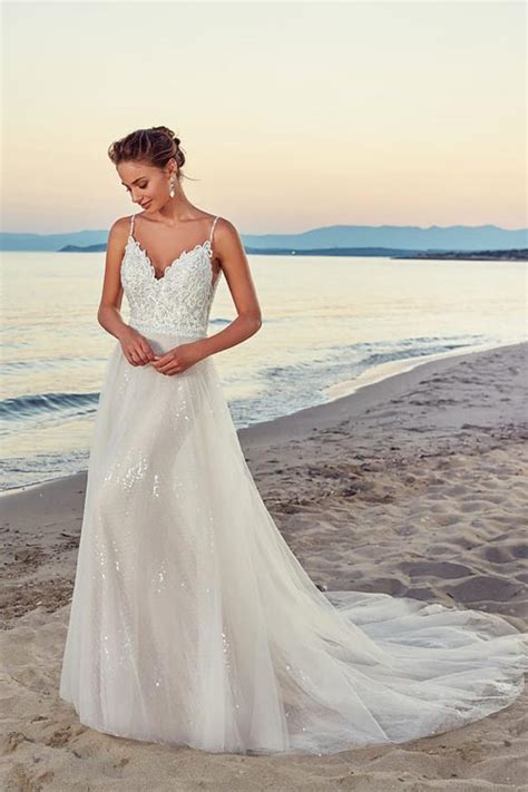 Neben den aktuellen brautkleider kollektionen und trends findet ihr hier die besten designer, brautmodeläden und tipps für euer hochzeitskleid. BH1340 Brautkleid Ivory/ Nude - Hochzeitshaus Berlin