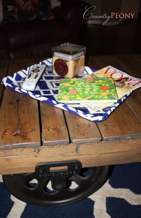 Underneath the table, you'll find plenty of space to store books and magazines, and it will be able to handle a good amount of weight due to its sturdy design. Country Peony: DIY Coffee Table Tray